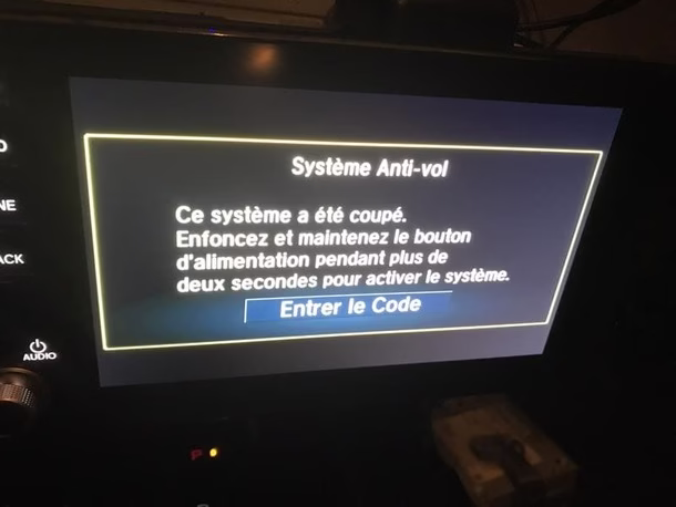Honda Civic dashboard with radio system requesting security code