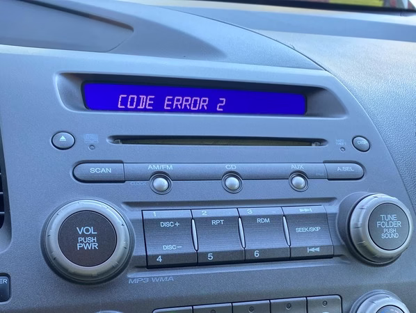 Honda Accord dashboard with radio system requesting code